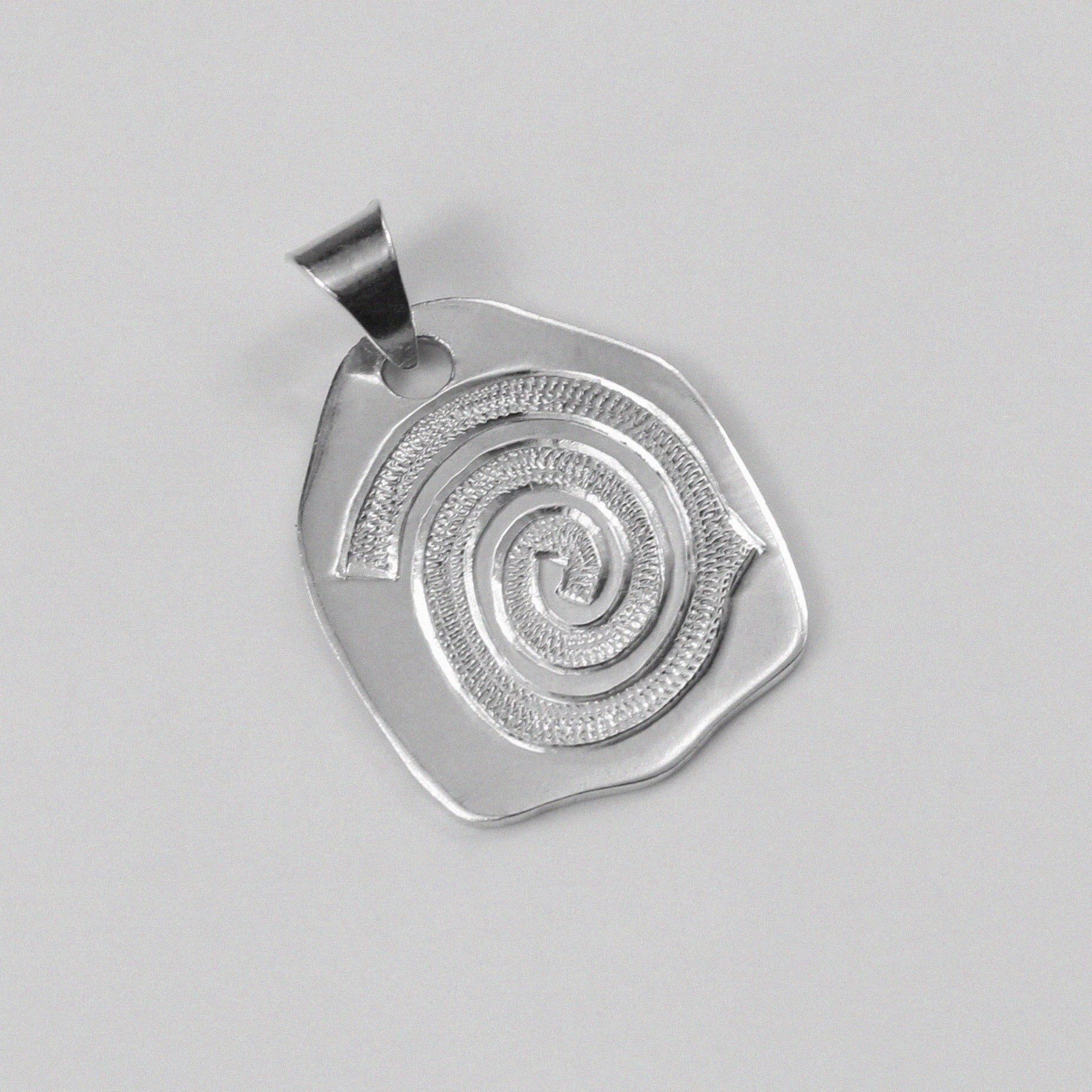 Vintage Spiral Pendant - A stunning 925 sterling silver pendant by GetTheJuice, showcasing an intricate spiral motif that blends vintage elegance with contemporary style.