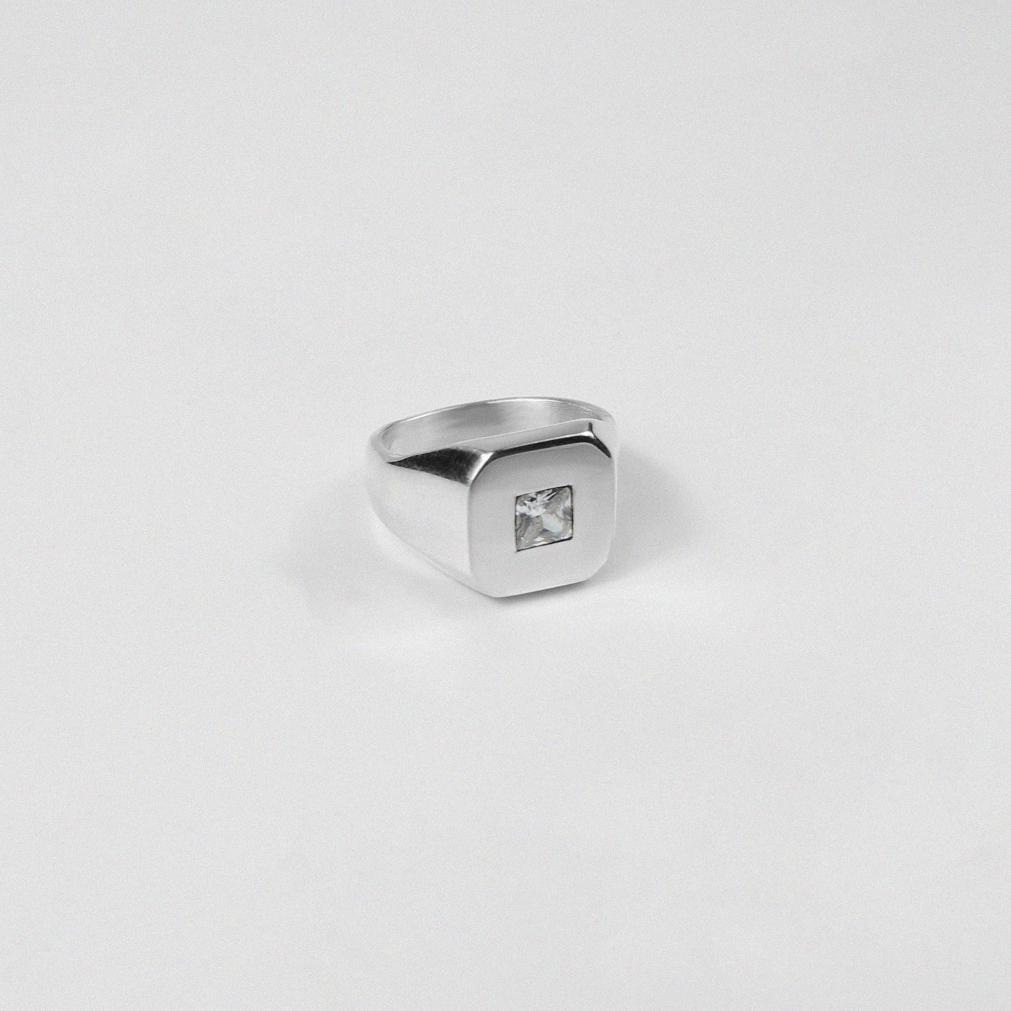 Sterling silver ring stamped '925,' showcasing a sleek baguette-cut gemstone, named 'Baguette Emblem.