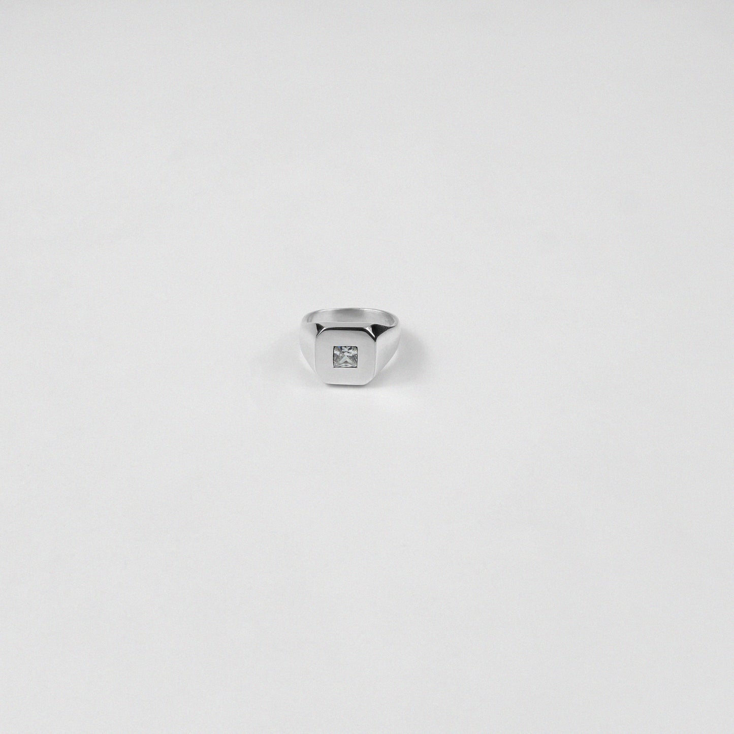 Sterling silver ring stamped '925,' showcasing a sleek baguette-cut gemstone, named 'Baguette Emblem.