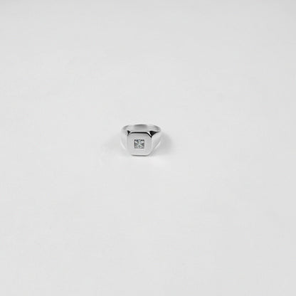 Sterling silver ring stamped '925,' showcasing a sleek baguette-cut gemstone, named 'Baguette Emblem.