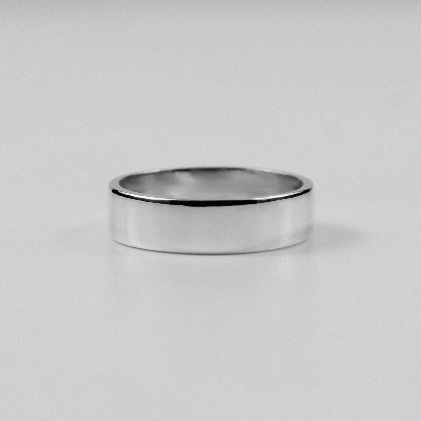 Sterling silver ring stamped '925,' featuring a refined circular design, named 'Circle of Elegance Ring.