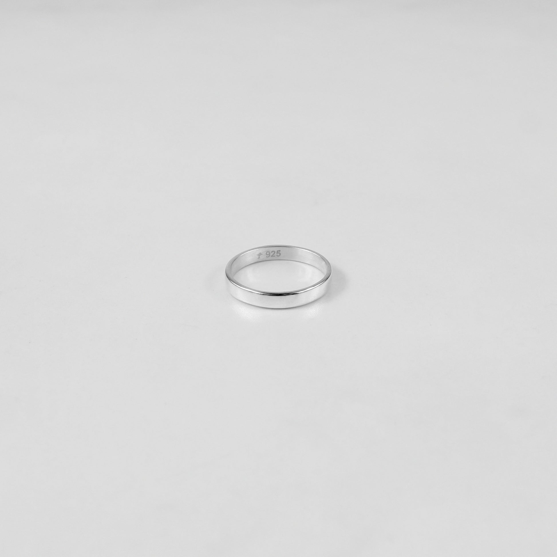 Sterling silver ring stamped '925,' featuring a refined circular design, named 'Circle of Elegance Ring.