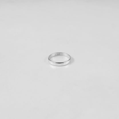 Sterling silver ring stamped '925,' featuring a refined circular design, named 'Circle of Elegance Ring.