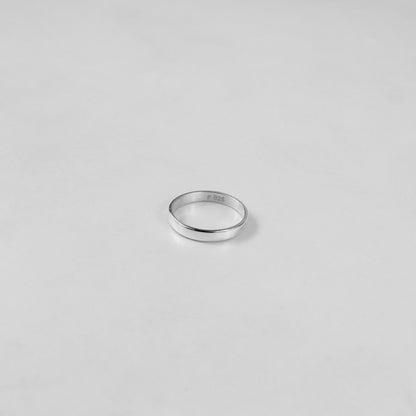 Sterling silver ring stamped '925,' featuring a refined circular design, named 'Circle of Elegance Ring.