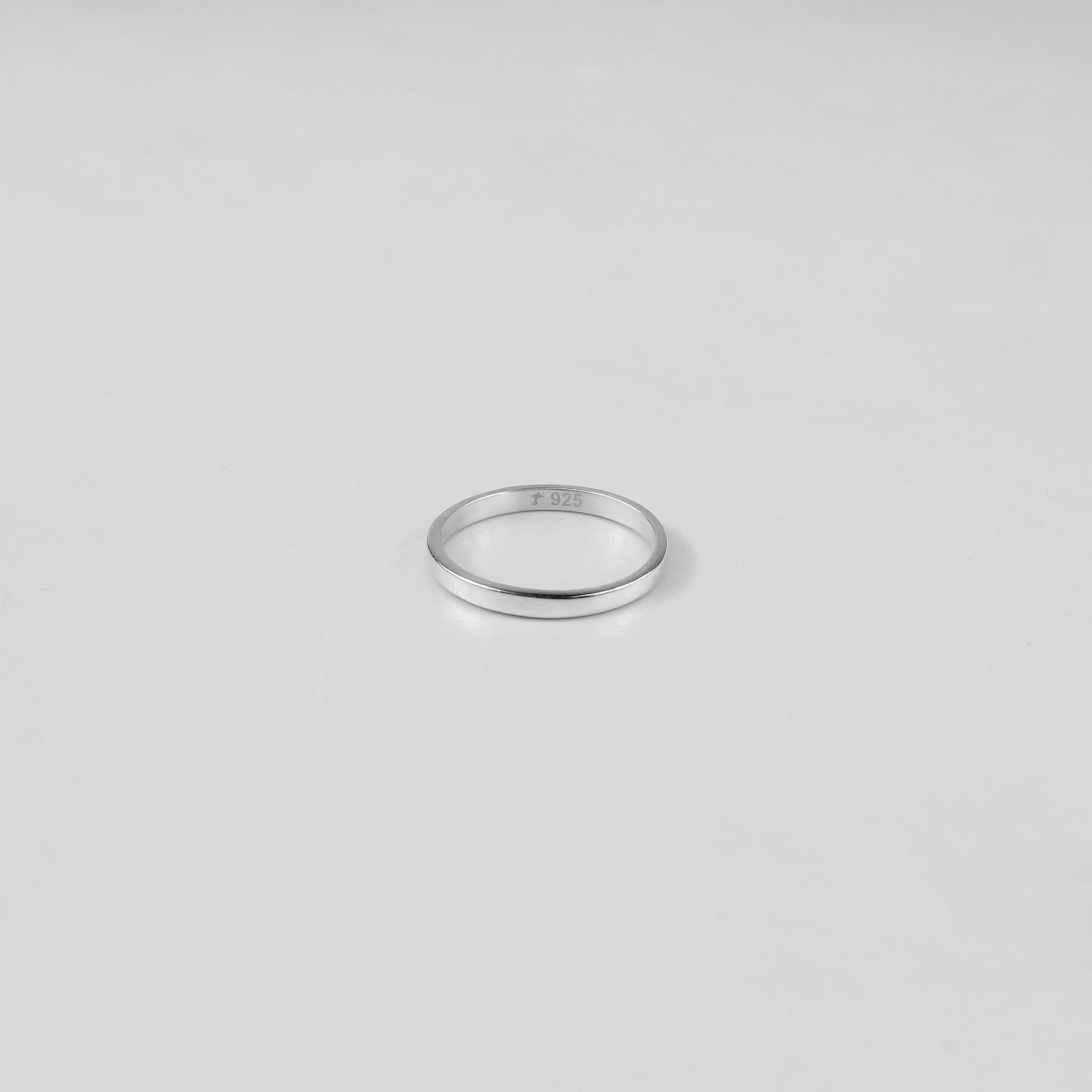 Sterling silver ring stamped '925,' featuring a refined circular design, named 'Circle of Elegance Ring.