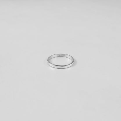 Sterling silver ring stamped '925,' featuring a refined circular design, named 'Circle of Elegance Ring.