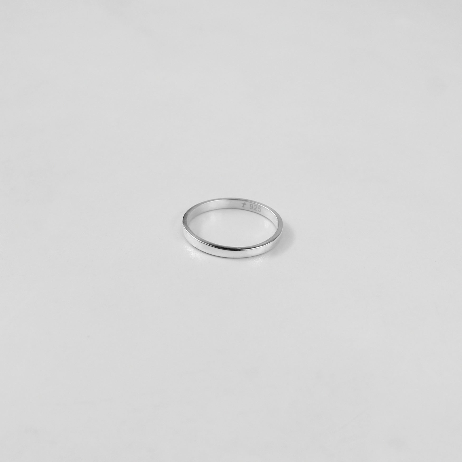 Sterling silver ring stamped '925,' featuring a refined circular design, named 'Circle of Elegance Ring.
