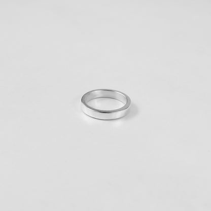Sterling silver ring stamped '925,' featuring a refined circular design, named 'Circle of Elegance Ring.