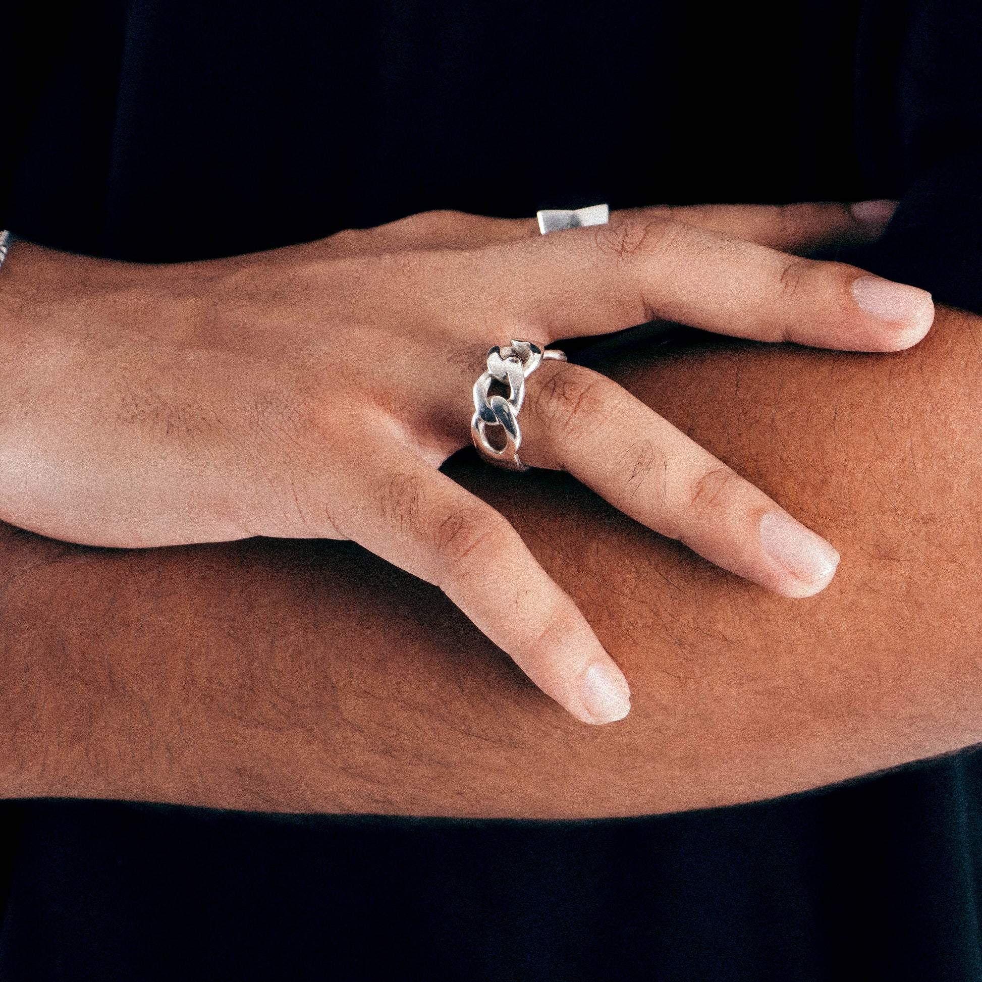 Sterling silver ring stamped '925,' featuring a smooth, curved design inspired by Cuban style, named 'Cuban Curve Ring.