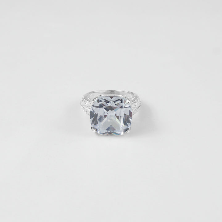 925 sterling silver ring named 'Cushion Cut Splendor,' featuring a dazzling cushion-cut centerpiece that radiates elegance and brilliance. Its exquisite design highlights a perfect blend of sophistication and charm, ideal for making a bold yet refined statement.