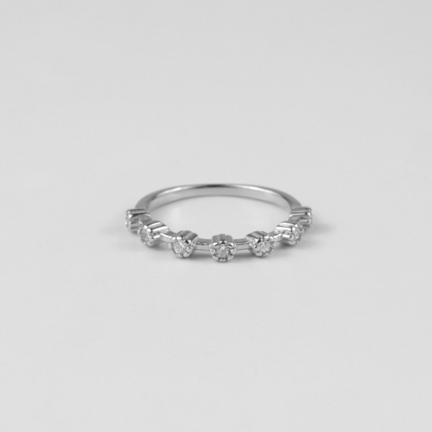 Sterling silver ring stamped '925,' featuring a delicate and graceful band design, named 'Ethereal Band Ring.