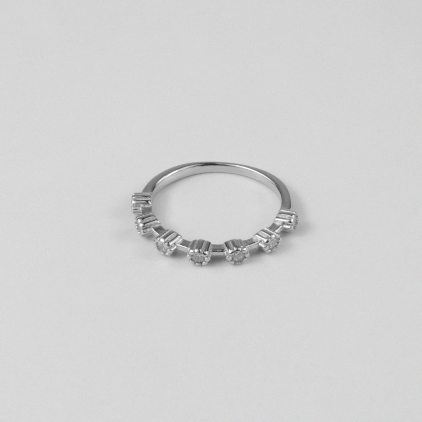 Sterling silver ring stamped '925,' featuring a delicate and graceful band design, named 'Ethereal Band Ring.