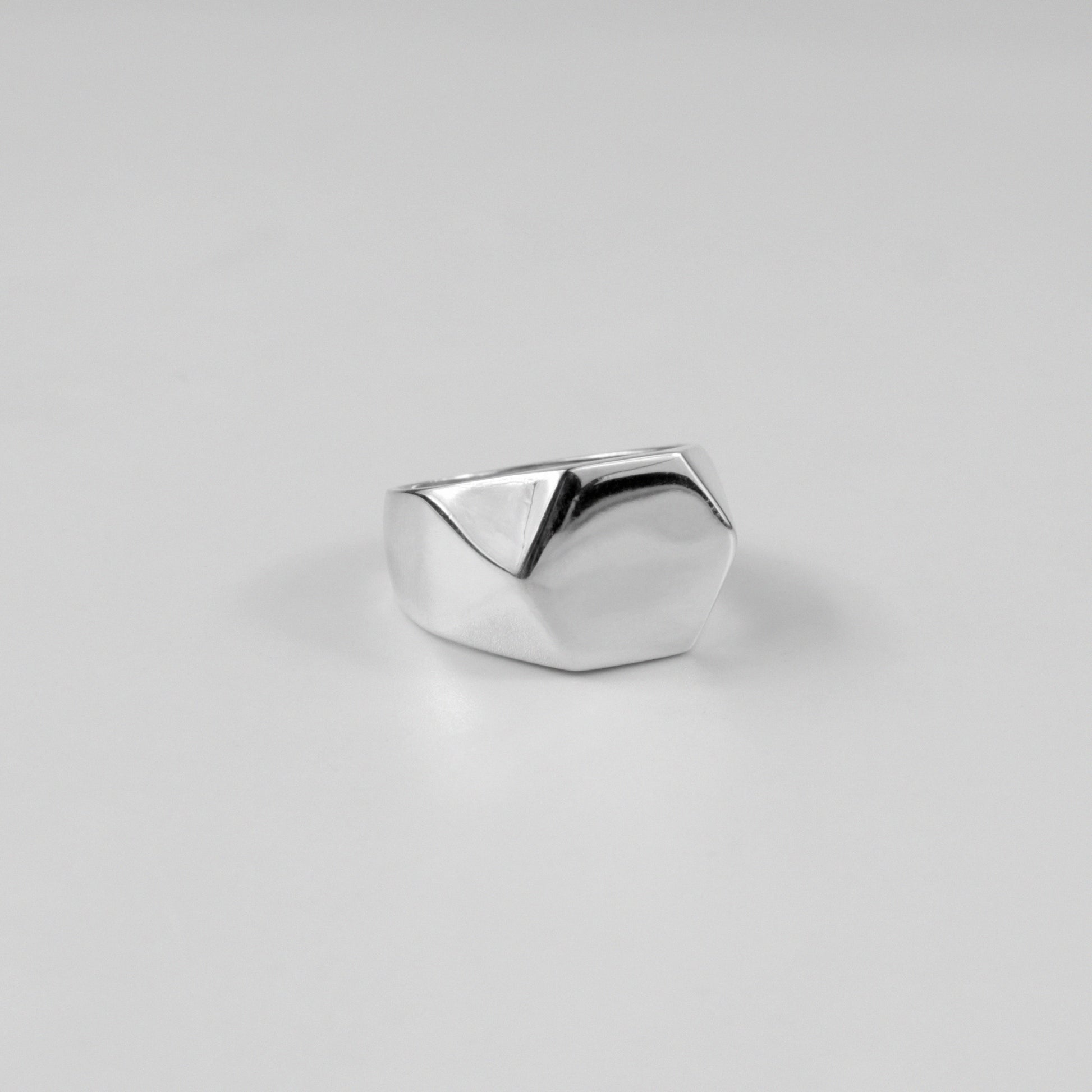 925 sterling silver signet ring featuring a bold hexagonal design, named 'HexaLuxe Signet Ring.