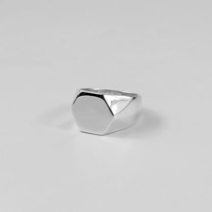 925 sterling silver signet ring featuring a bold hexagonal design, named 'HexaLuxe Signet Ring.