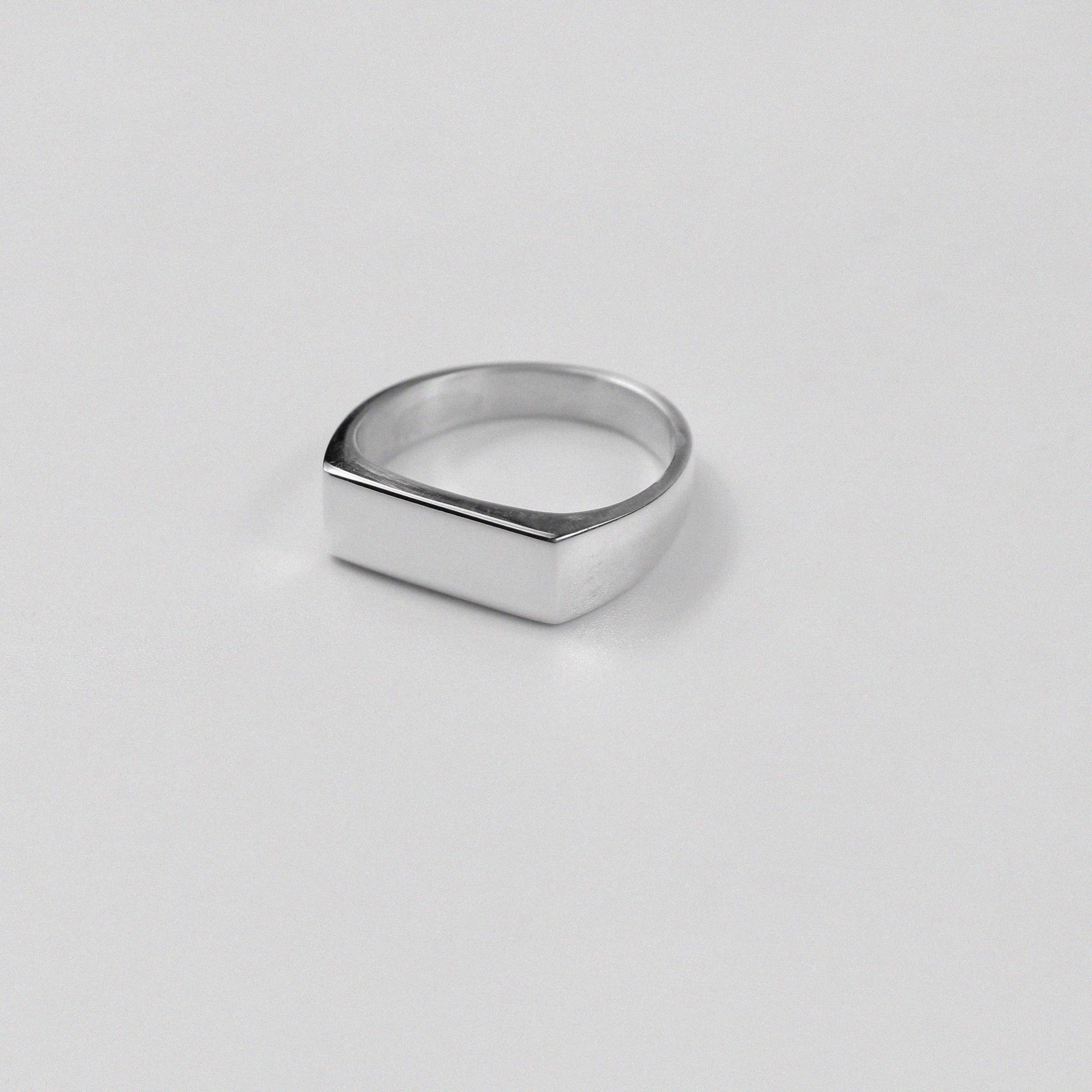 925 sterling silver band ring featuring a sleek, linear design, named 'Linear Elegance Band Ring.