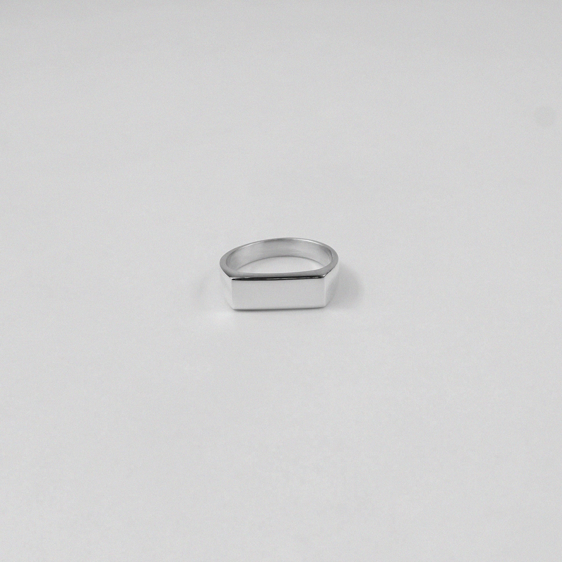 925 sterling silver band ring featuring a sleek, linear design, named 'Linear Elegance Band Ring.