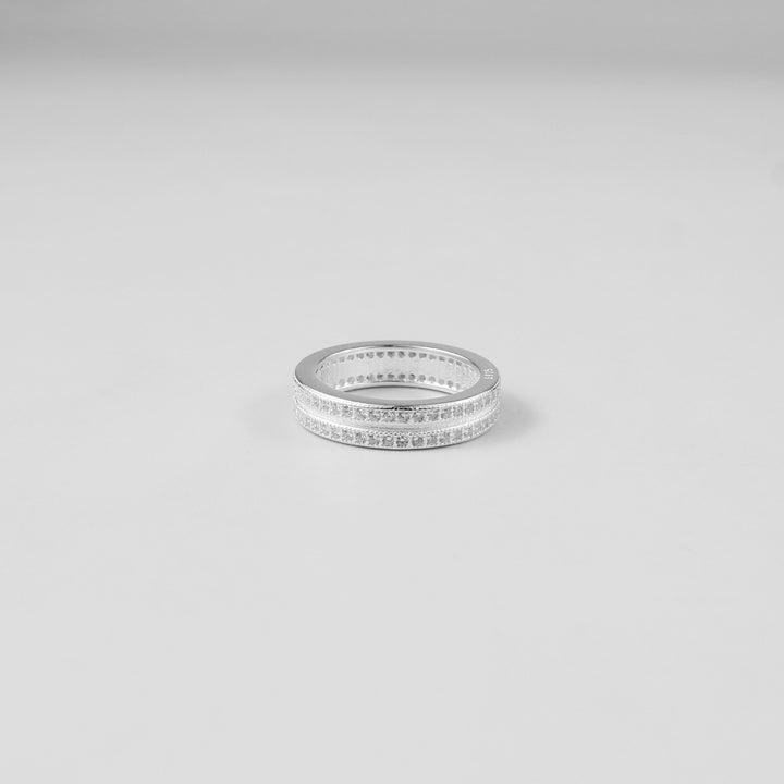 Minimalistic and elegant 925 sterling silver band ring named 'Lucent.' Its design reflects timeless simplicity and understated sophistication, perfect for everyday wear or special occasions.