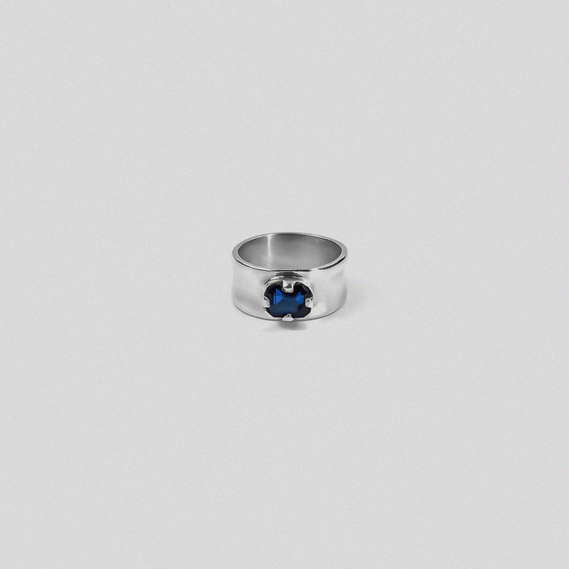 "925 sterling silver ring featuring a deep blue sapphire gemstone, named 'Midnight Sapphire Ring.'"