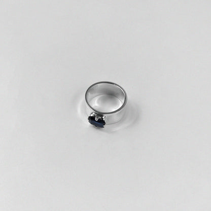 "925 sterling silver ring featuring a deep blue sapphire gemstone, named 'Midnight Sapphire Ring.'"