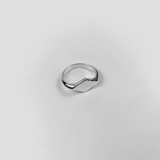 "925 sterling silver signet ring featuring a smooth, polished design, named 'Milley Signet Ring.'"