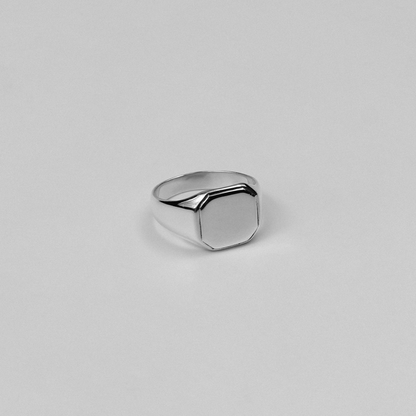 "925 sterling silver signet ring featuring a bold octagon-shaped design, named 'Octagon Signet Ring.'"