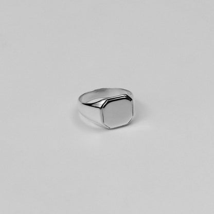 "925 sterling silver signet ring featuring a bold octagon-shaped design, named 'Octagon Signet Ring.'"