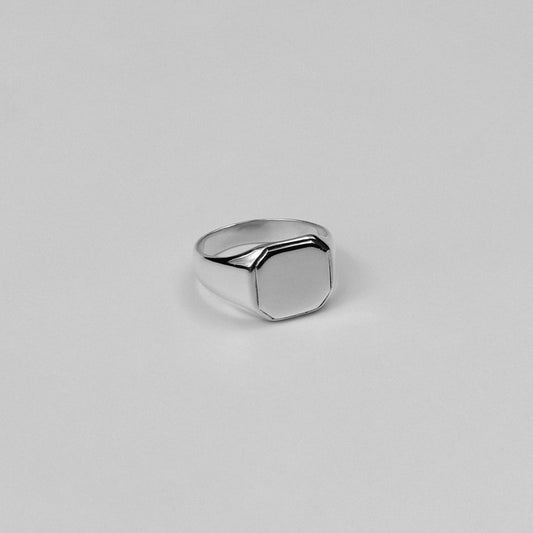 "925 sterling silver signet ring featuring a bold octagon-shaped design, named 'Octagon Signet Ring.'"