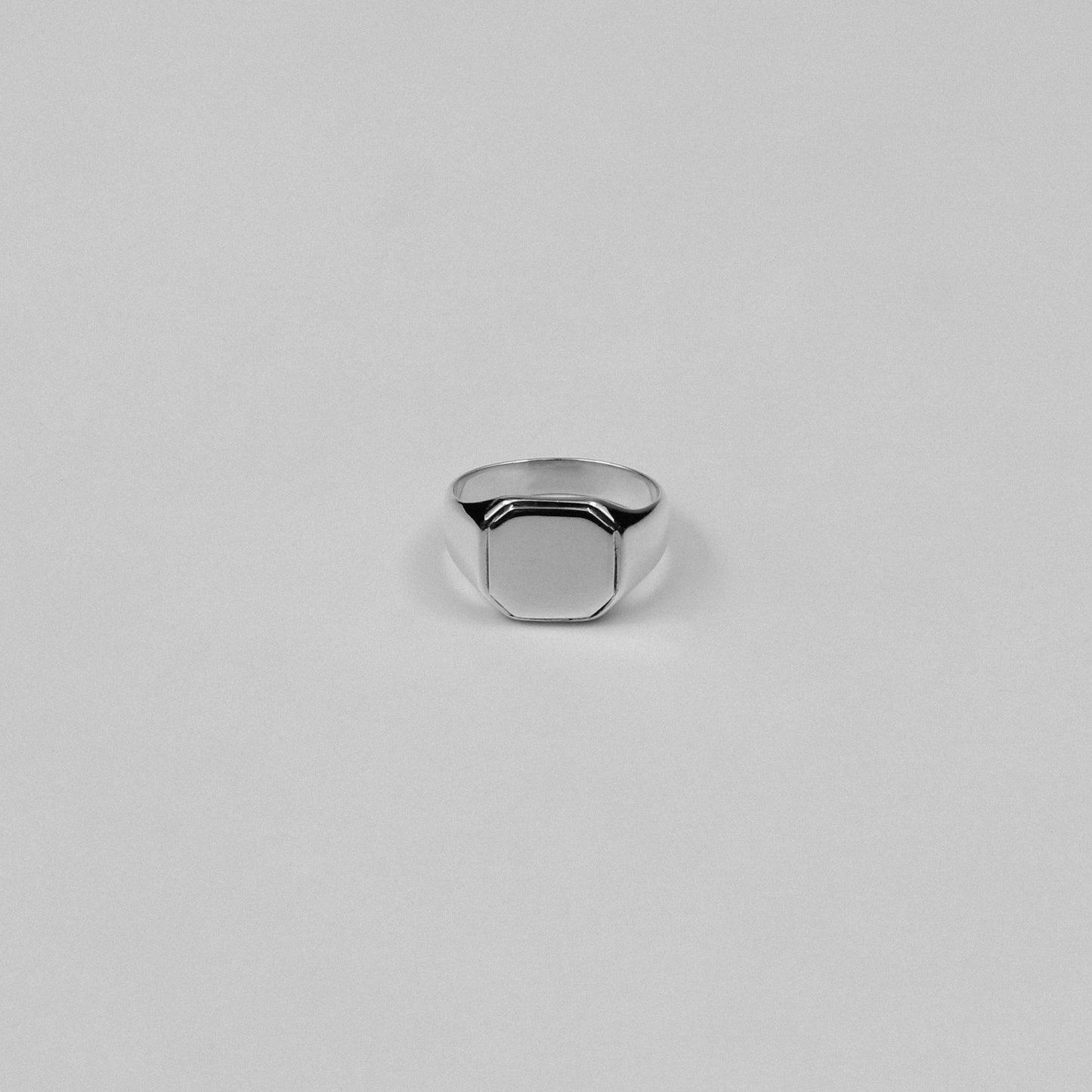 "925 sterling silver signet ring featuring a bold octagon-shaped design, named 'Octagon Signet Ring.'"