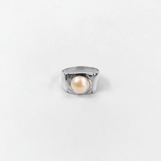 "925 sterling silver ring featuring a cascading design with luminous pearls, named 'Pearl Cascade Ring.'"