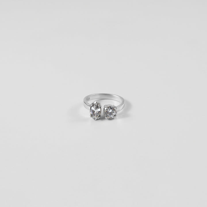 925 sterling silver ring featuring a harmonious design with pear and oval-shaped gemstones, named 'Pear & Oval Symphony Ring.