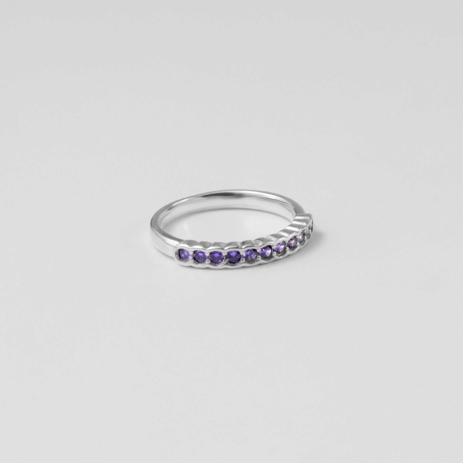 "925 sterling silver ring with a pebble-inspired design, symbolizing natural elegance, named 'Pebble Embrace Ring.'"