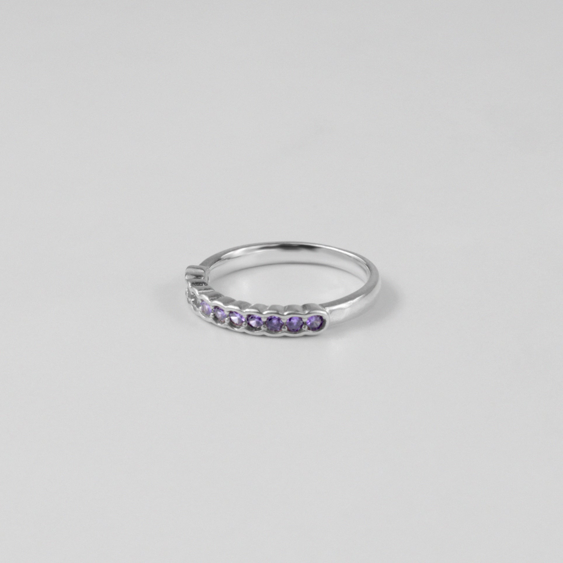 "925 sterling silver ring with a pebble-inspired design, symbolizing natural elegance, named 'Pebble Embrace Ring.'"