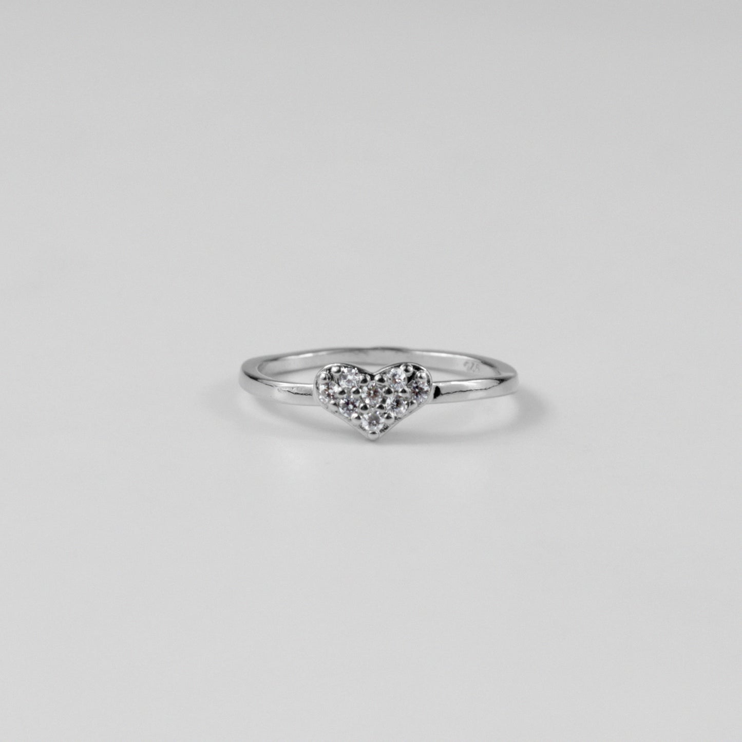 "925 sterling silver ring with a glowing design that symbolizes eternal love, named 'Radiant Love Ring.'"