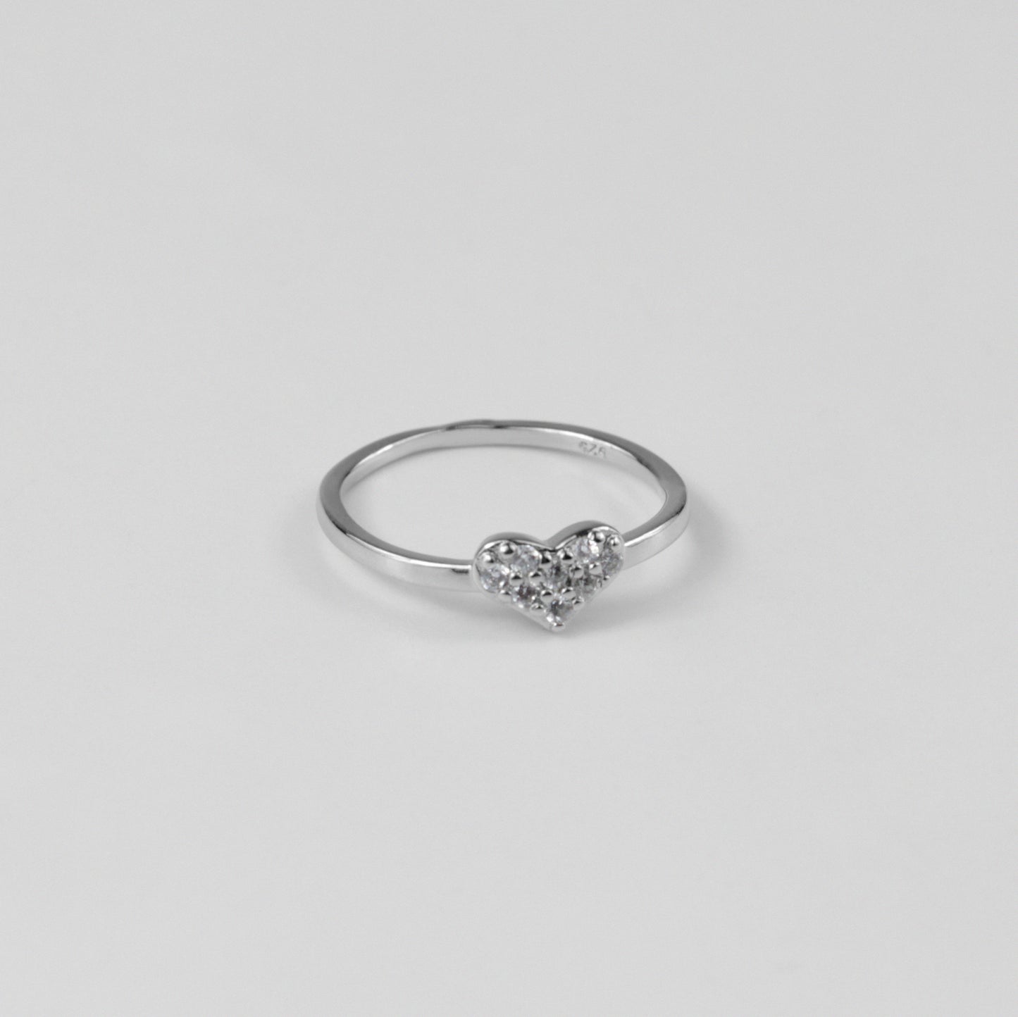 "925 sterling silver ring with a glowing design that symbolizes eternal love, named 'Radiant Love Ring.'"