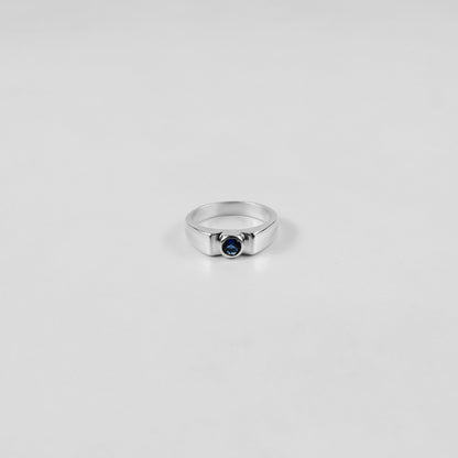 925 sterling silver ring featuring a classic design with a round white stone at its center, named 'White Round Stone Ring.