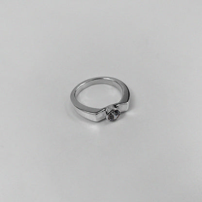 925 sterling silver ring featuring a classic design with a round white stone at its center, named 'White Round Stone Ring.