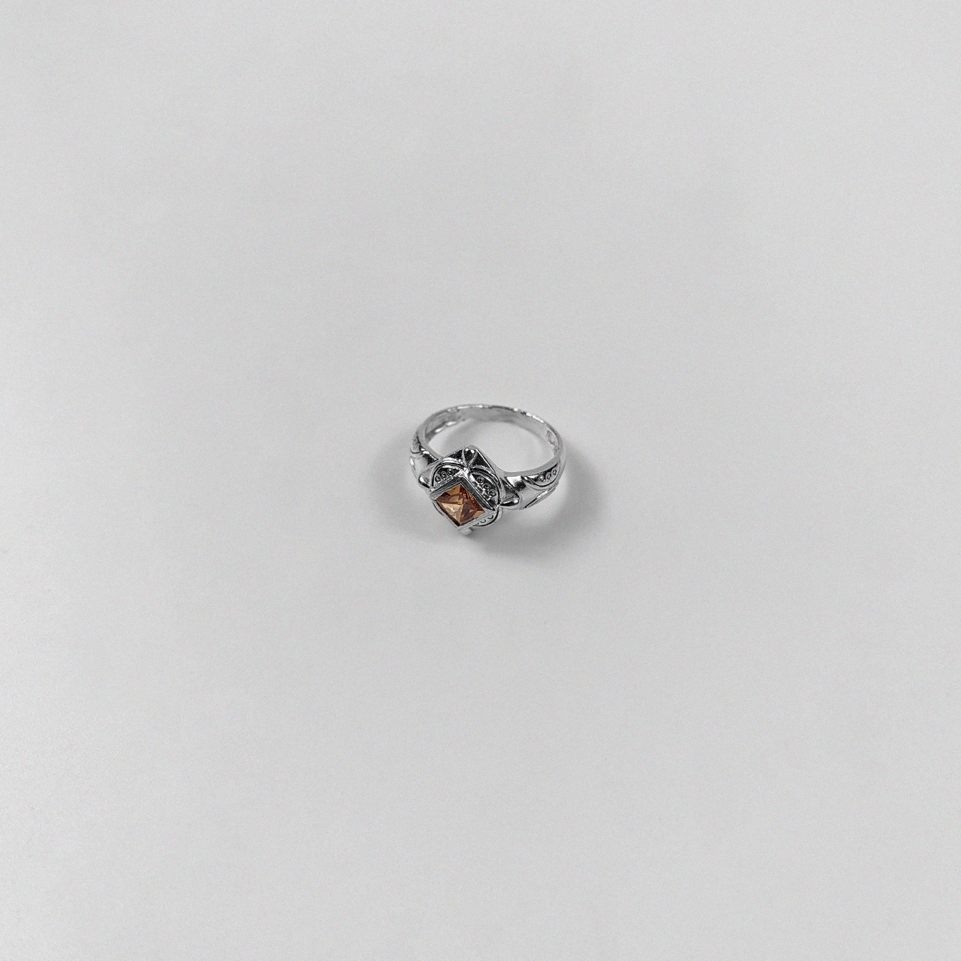 "925 sterling silver ring featuring a rustic yet elegant design, named 'Rustic Elegance Ring.'"
