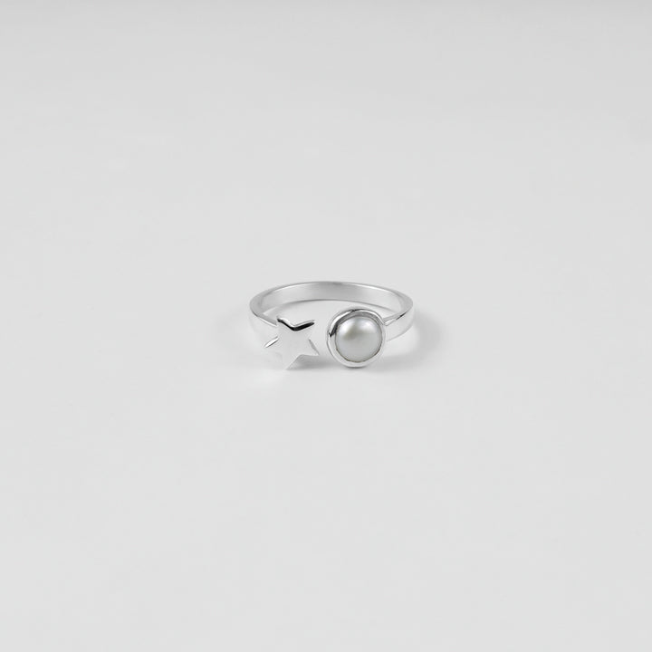 
"925 sterling silver ring featuring a star and pearl design, offering a touch of elegance and charm, named 'Star & Pearl Ring.'"