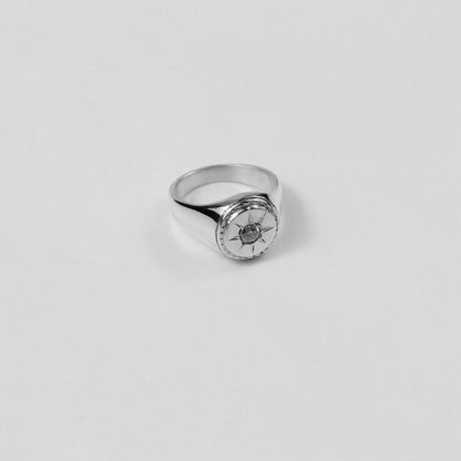 "925 sterling silver signet ring with a distinctive star-shaped design, named 'Star Signet Ring.'"