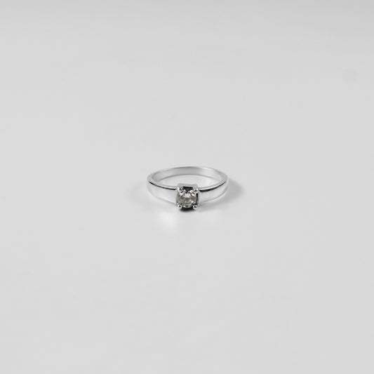 A polished Sterling Grace Band Ring made from 925 sterling silver, exuding refined elegance and subtle charm.