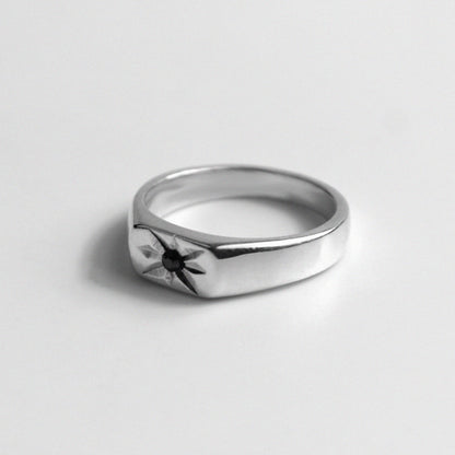 925 sterling silver signet ring featuring a thin design with a starburst pattern, named 'Thin Starburst Signet Ring.