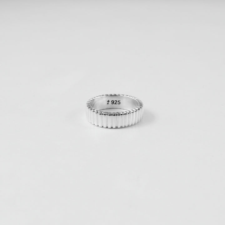 925 sterling silver ring named 'Tiered Symphony,' featuring an elegant layered design that creates a harmonious blend of textures and patterns. Its intricate craftsmanship evokes a sense of rhythm and balance, making it a captivating piece for any occasion.